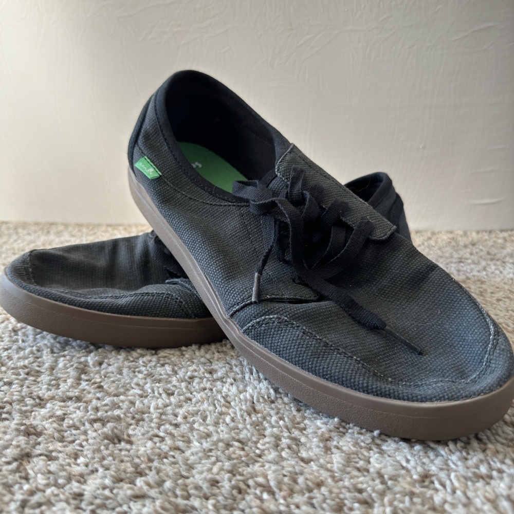 Black/ Brown Sanuk
Size 12